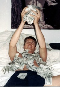 Yes, I'm celebrating life playing in a pile of $20,000! AND YES THOSE ARE ALL $100 NOTES!